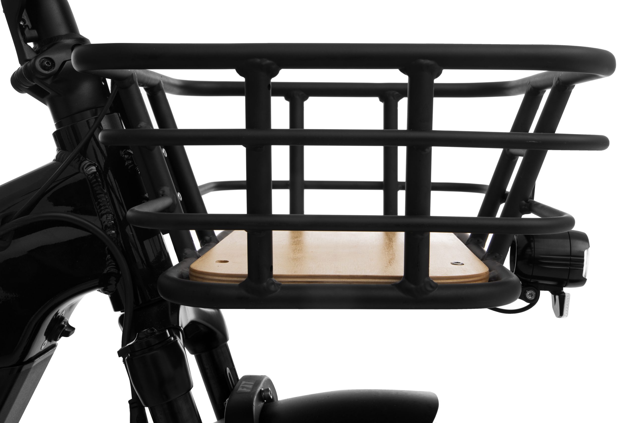 A closeup of a black cargo tricycle basket with a wooden base, ideal for carrying goods. Perfect for adult tricycles and seniors.