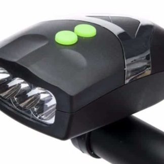 A close-up of a black bicycle light with two green buttons on top. The light is mounted on a black handlebar.