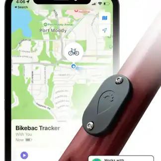 Bike tracking device mounted on a red tricycle handlebar in Australia.