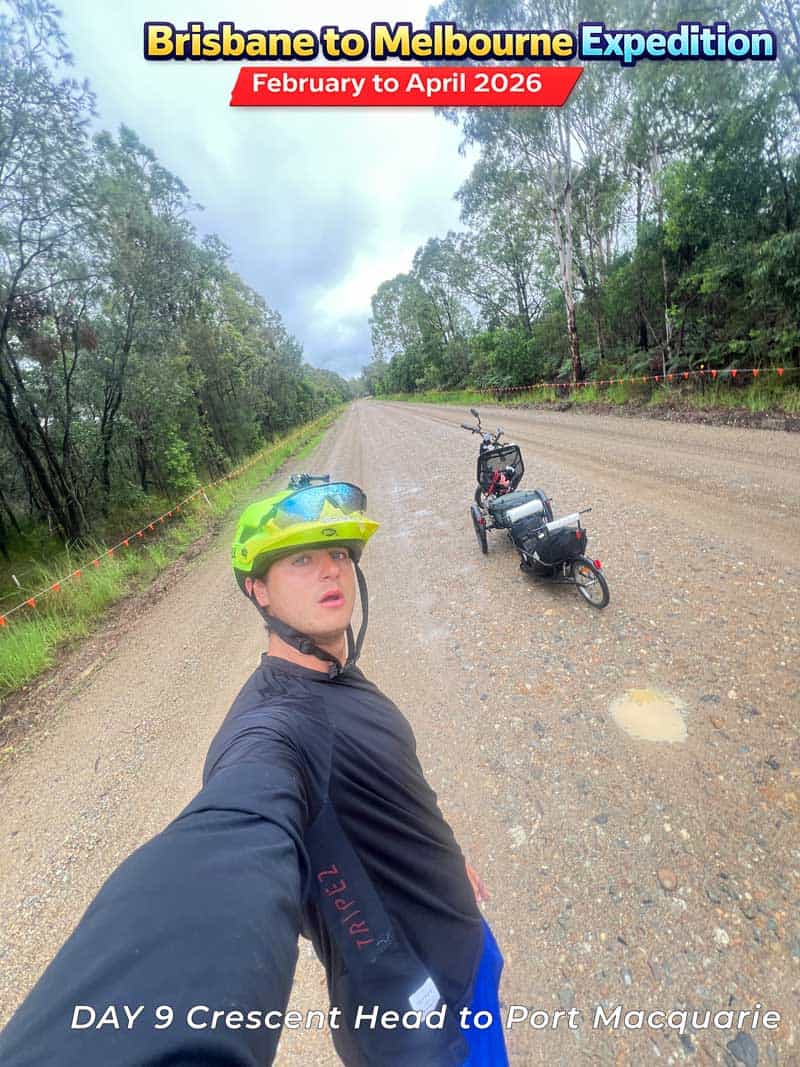 Man wearing helmet on adult tricycle