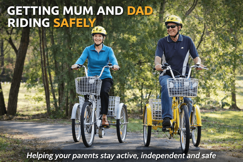 Senior couple riding yellow and blue adult tricycles with baskets. The couple are wearing helmets for safety.