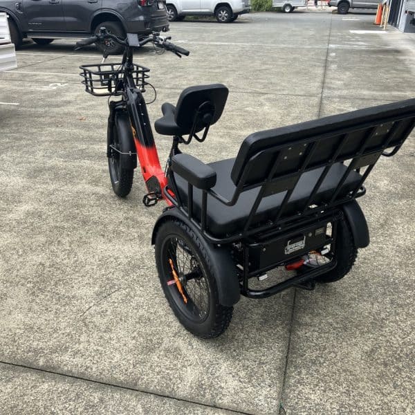 Red Electric Tricycle for Adults in Australia An adult electric tricycle in red, perfect for seniors and disability mobility. Features a sturdy frame and comfortable seating.